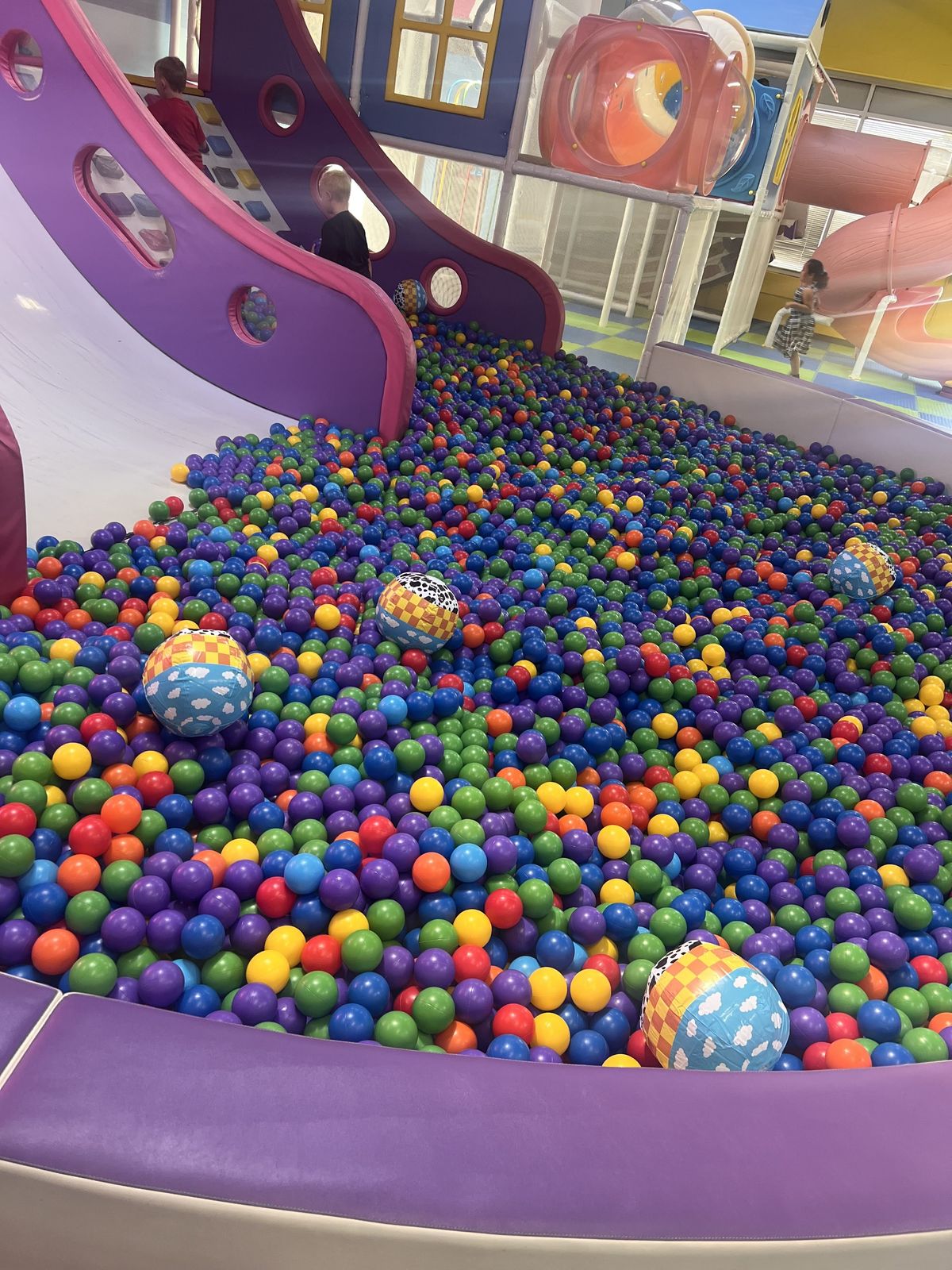 Large colorful ball pit inside the playground