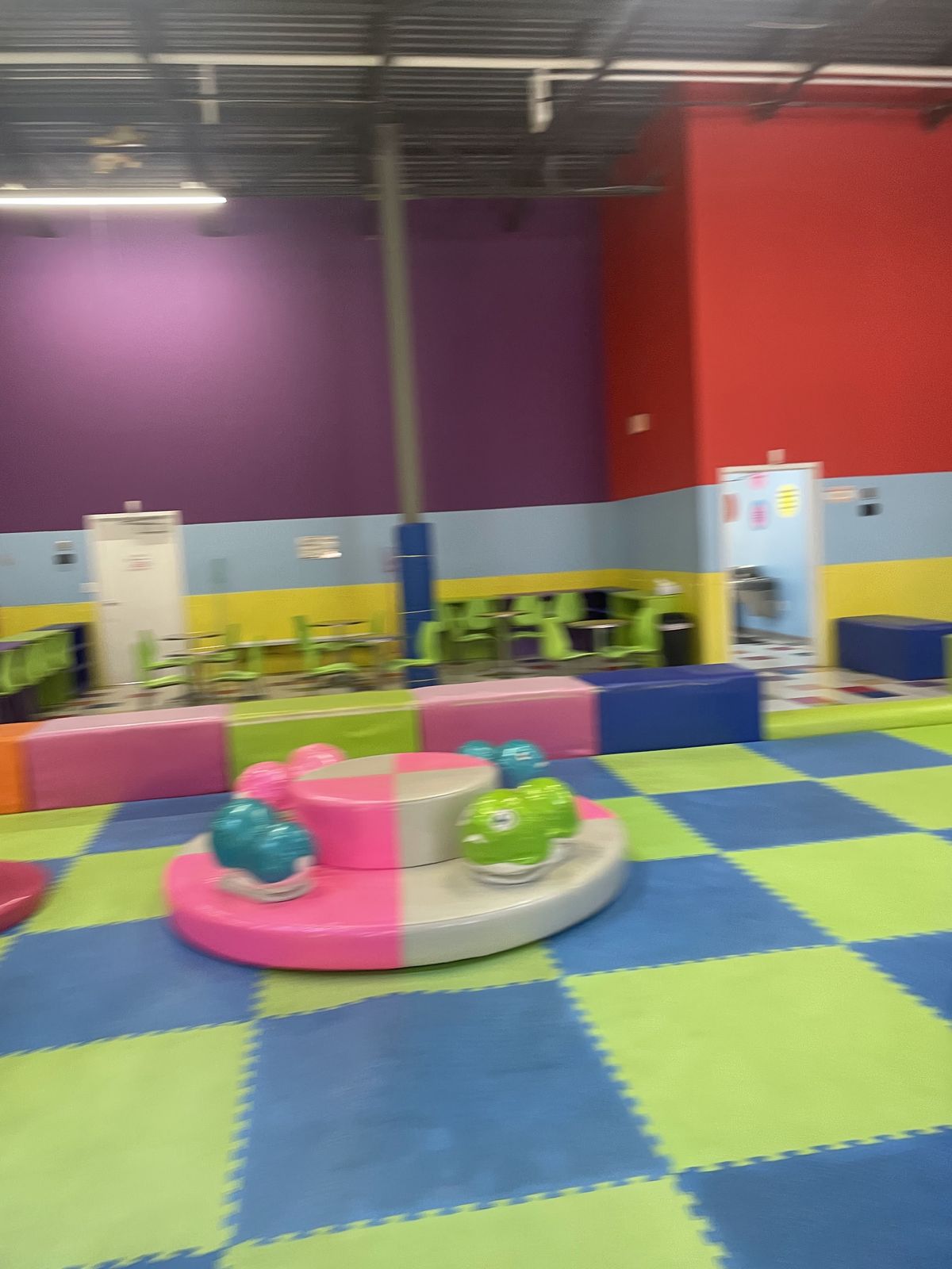 Soft-play steps and colorful ride-on toys