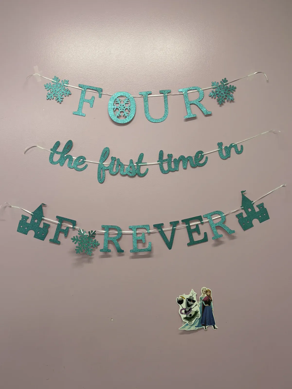 Fourth birthday banner reading Four the best time ever