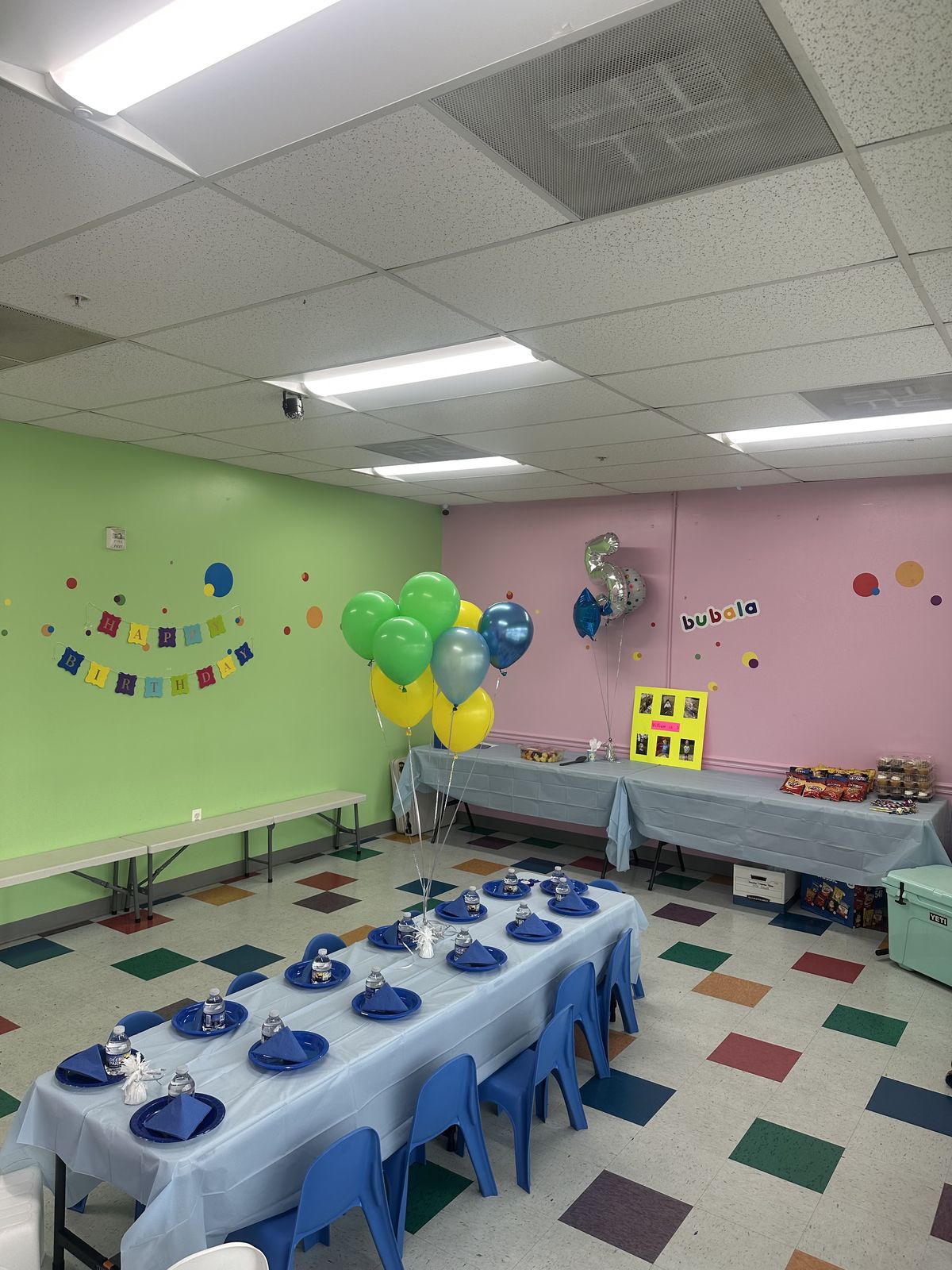Green and pink party setup with matching balloons